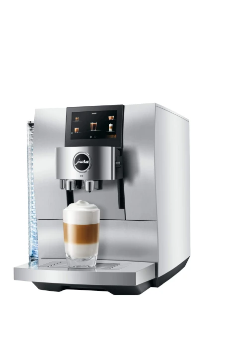 Ekspres Jura Z10 w kolorze Aluminium White, zaprezentowany od prawej strony, ze szklanką kawy Latte Macchiato