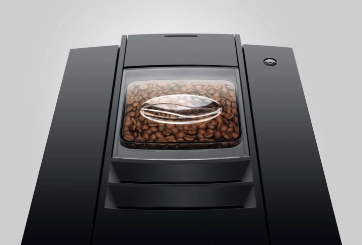 Ekspres Jura E4 EA w kolorze Piano Black, zbliżenie na pokrywę młynka