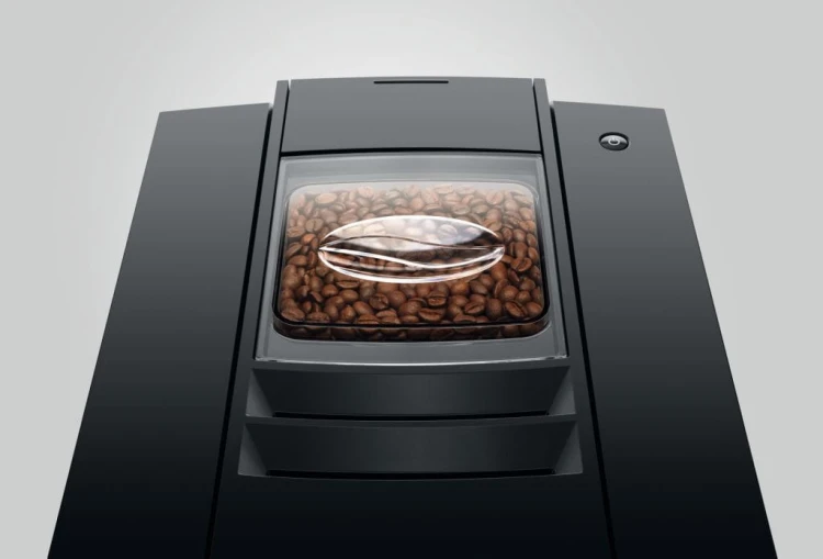 Ekspres Jura E4 EA w kolorze Piano Black, zbliżenie na pokrywę młynka