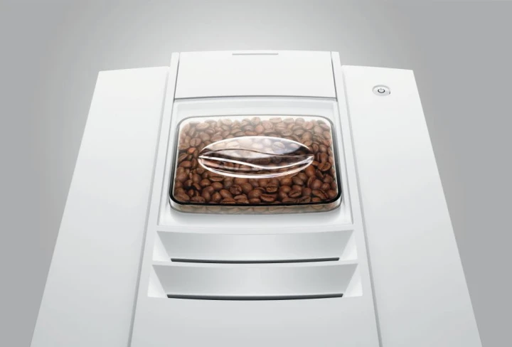 Ekspres Jura E4 EA w kolorze Piano White, zbliżenie na pokrywę młynka