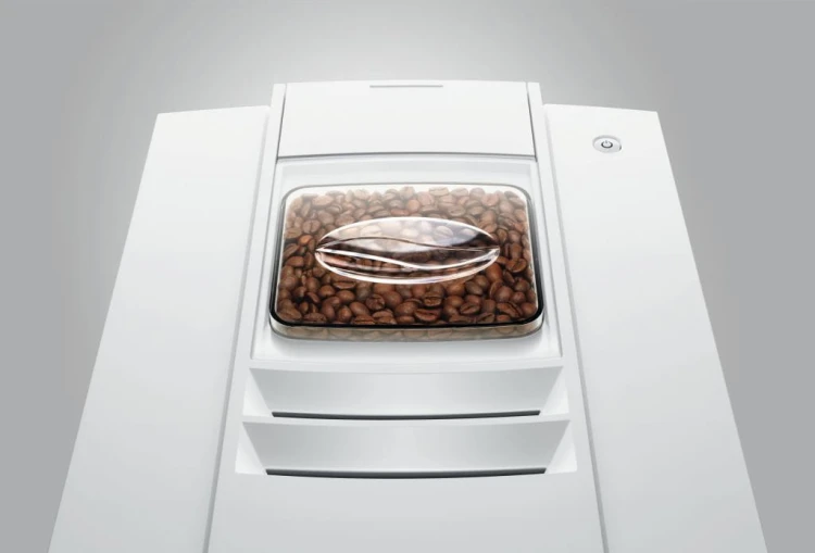 Ekspres Jura E4 EA w kolorze Piano White, zbliżenie na pokrywę młynka