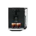 Ekspres Jura ENA 8 EC w kolorze Full Metropolitan Black, zaprezentowany z dwiema kawami espresso