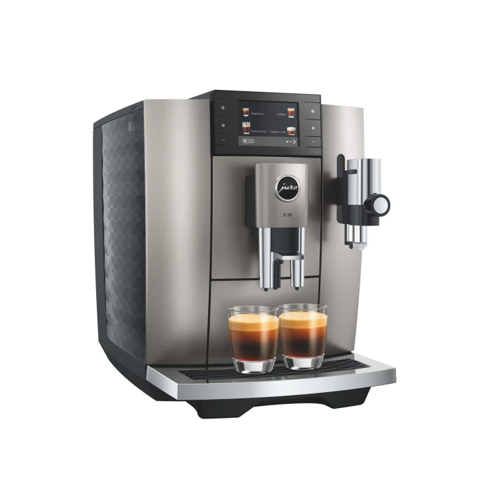 Ekspres Jura E8 ED w kolorze Midnight silver - srebrnym, zaprezentowany z dwiema kawami espresso od lewej strony z widokiem na zbiornik wody