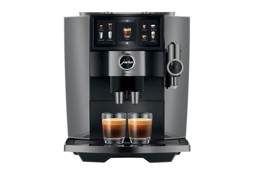 Ekspres Jura J10 Twin w kolorze Diamond Onyx, zaprezentowany od frontu z dwiema kawami espresso